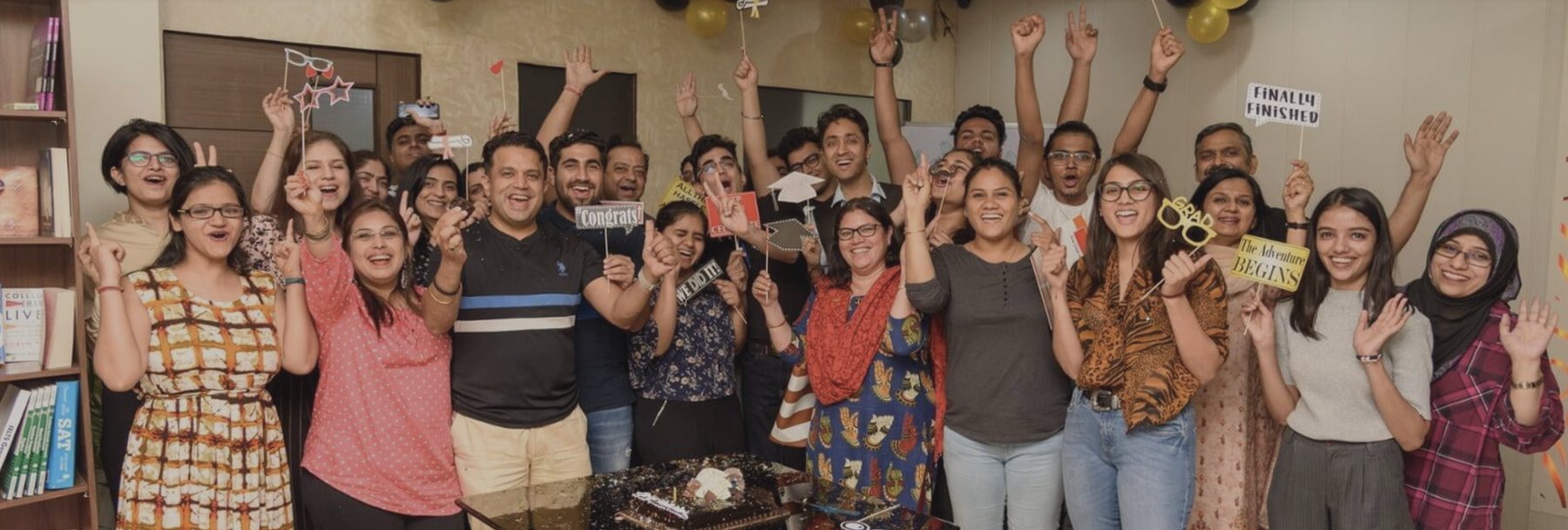 Students and team celebrating admission results